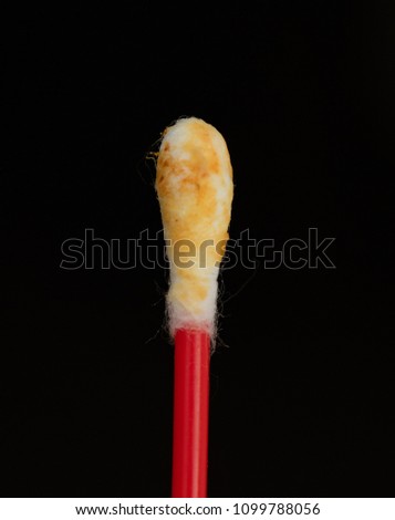 eared sticks with sulfur on a black background