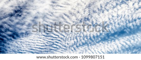 Blue Sky with Stripes Clouds Texture with copy space, may use as background