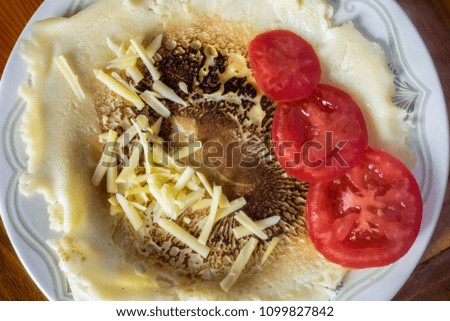 Pancake with salad