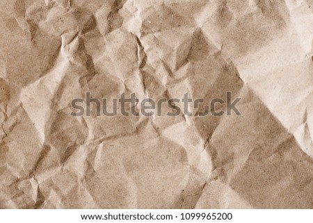 Textured brown craft paper close-up background copy space