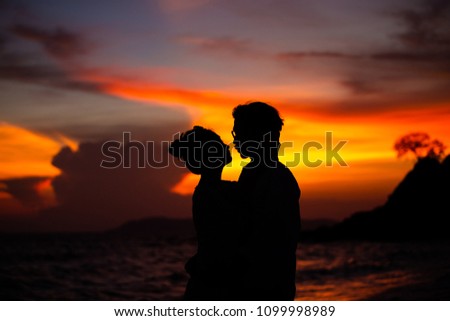 siluate lovers at the beach, pre-wedding shoot  