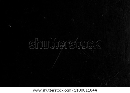 abstract black textured dust background. distressed dark scratched stucco design. free space concept