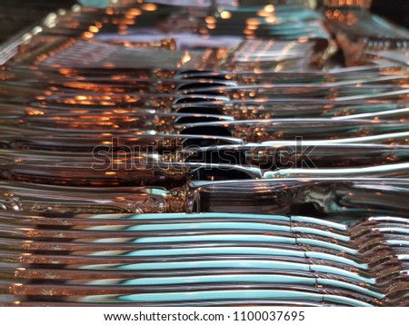 Close up picture of fancy silverware ready to be set in a table 