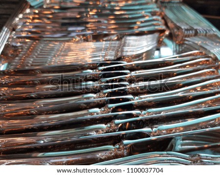 Close up picture of fancy silverware ready to be set in a table 