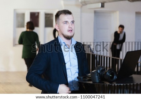Businessman working on laptop computer at coworking office. Coworking open space