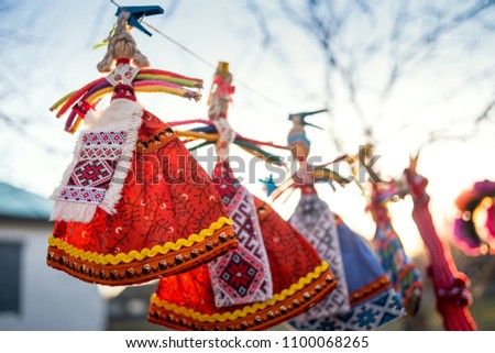 Ukrainian traditional doll amulet in national bright costume, sold at the fair