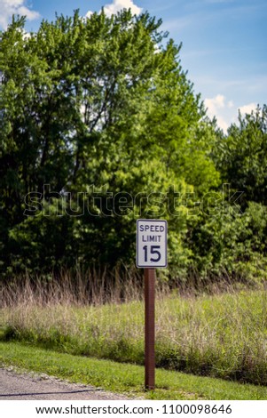 Speed Limit Sign Next to Road