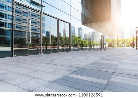 Modern glass building Royalty-Free Stock Photo #1100126591
