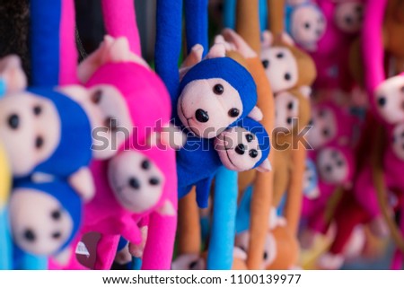 
Monkey dolls are arranged in bright colors
