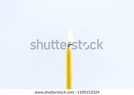 Candlelight isolated on white background with copy space, Yellow Candle
