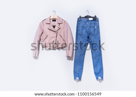 Close up denim jacket jeans ,blue jeans on hanging

