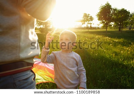 father and son and a kite