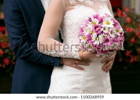 wedding couple in a different modern photo position