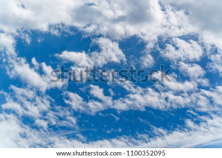 Beautiful bright blue sky with clouds, summer day