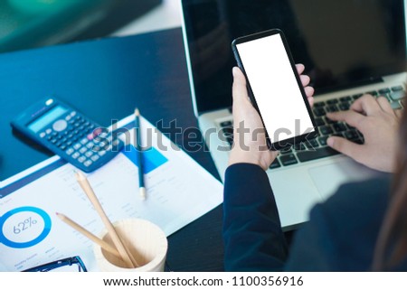 Mock up woman hand holding smart phone . businessman working with modern devices, student boy using digital tablet computer and mobile smart phone,business concept,selective focus,vintage color