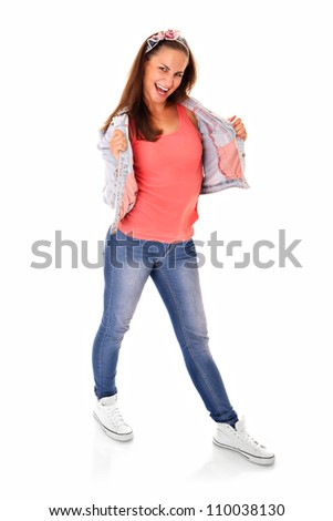 A picture of a young happy woman dancing over white background