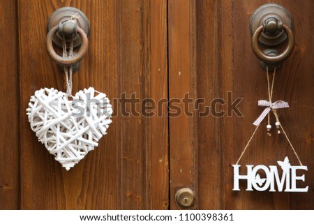 home sign on door handle