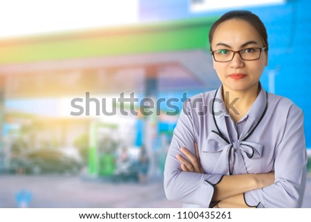 Asian woman staff oil or gas station using energy for car or transportation, 
automobile, automotive, refuel, image