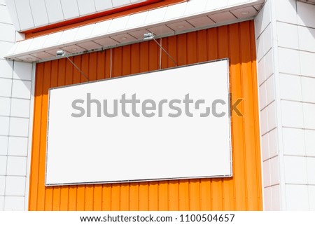 Billboard, billboard, canvas billboard, layout on the background of the city. The concept of outdoor advertising, marketing, sales. mockup