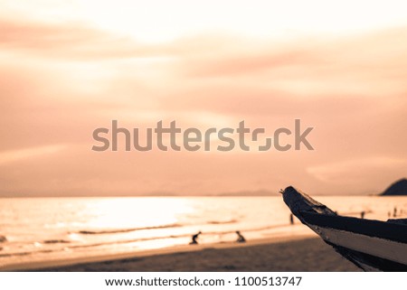 wood boat with the typical sea on background