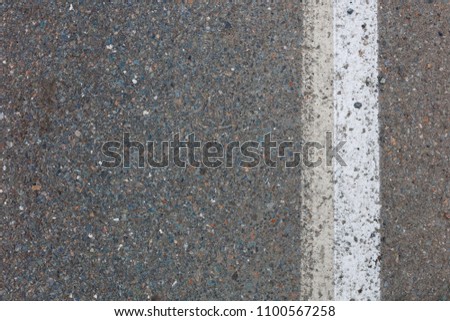 old colored asphalt with white markings. high texture quality