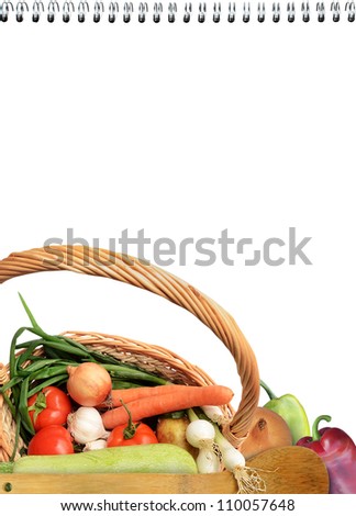 Fresh vegetables and white notebook for recipes