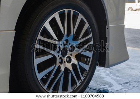 Striped Alloy Wheels cars close-up.