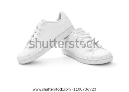 White sneakers on white background, including clipping path Royalty-Free Stock Photo #1100736923