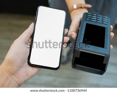 women holding phone, female payment Credit card matchine ,nfc mobile payment ,online shopping concept