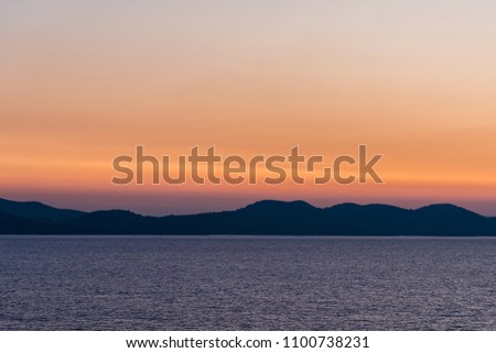 Orange lines on the sky, Adriatic Sea, Croatia