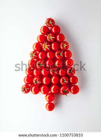 icon of a christmas tree made of tomatoes