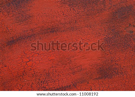 lots of texture, painted cracked wood surface, rich red color