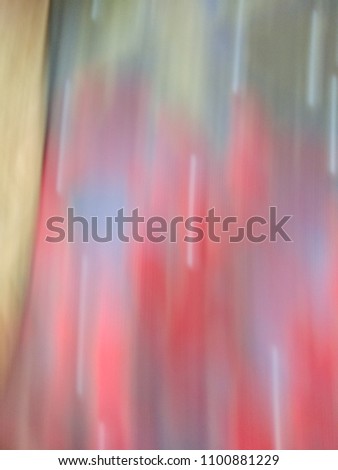 Motion blurred Multicolor City lights with abstract smooth lines. Abstract background of Red, Yellow, Blue, Purple, Orange and Pink color. 