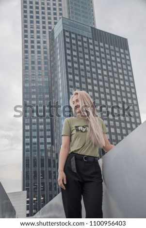 Blond girl in Rotterdam on the bridge