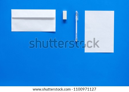 Mockup template for branding identity. White stationery on blue background top view copy space. Pattern