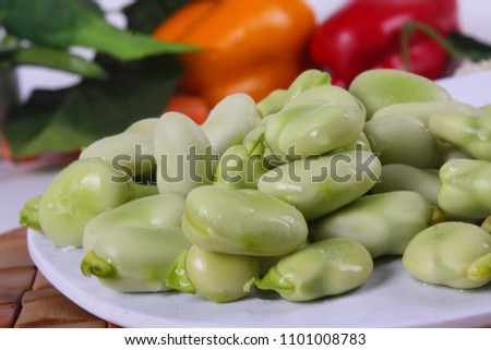 Egyptian green beans on a white background