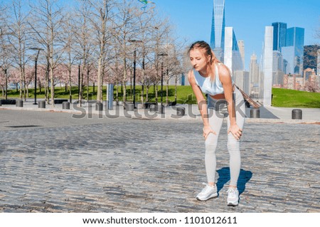 Healthy lifestyle. Woman is running in New York. Fitness sports runner is jogging in  the city