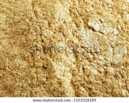 Gold mica pigments powder for cosmetics Royalty-Free Stock Photo #1101028289
