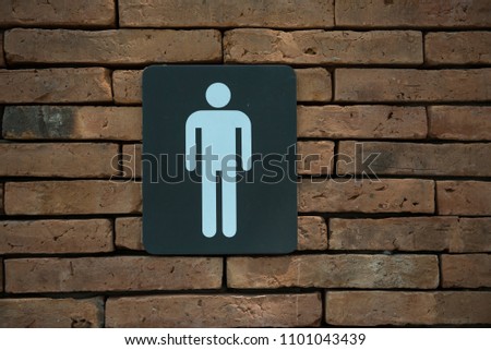  bathroom sign on a toilet door
