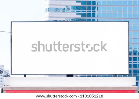 Blank billboard or advertising poster on the building wall mock up, for advertisement concept background.