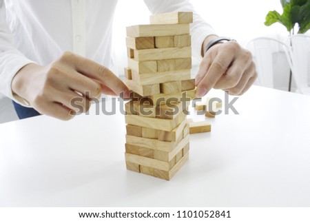 Player removing block from Jenga tower constructed - Stock image
Toy Block, Brick, Human Hand, Toy, Block Removal Game ,block wood jenja