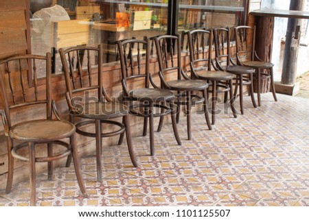 Old wooden chairs in the aisles