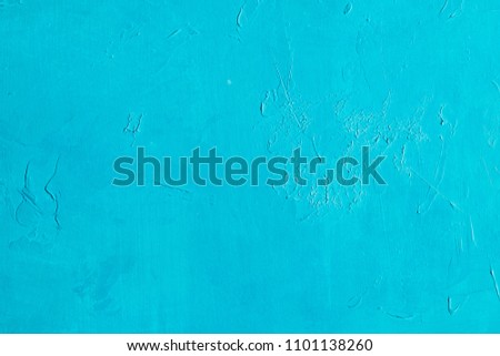 cyan scratched background. distressed blue stucco plaster texture decor. free space concept