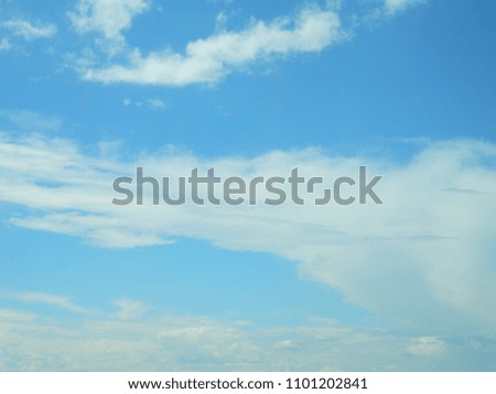 Clouds. Background landscape with clouds. Sunlight and rays. White and gray clouds before the rain. Thunderclouds.