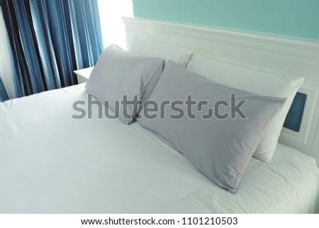 Beautiful white and blue tone color bed set in the bedroom