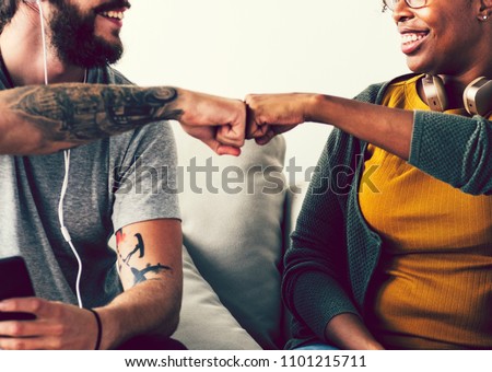 Musicians fist bumping for a job well done Royalty-Free Stock Photo #1101215711