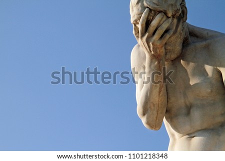 Head in hands - Facepalm statue in Paris, France Royalty-Free Stock Photo #1101218348