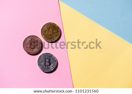 top view of arranged various bitcoins on colorful background