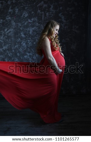 pregnant girl in red dress