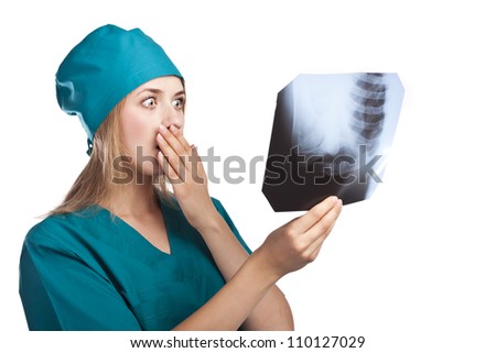 Doctor looking at x-ray. Diagnoses the patient